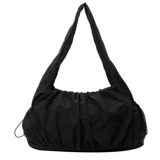 Sac cabas effet drape noir — vue de face sur fond blanc