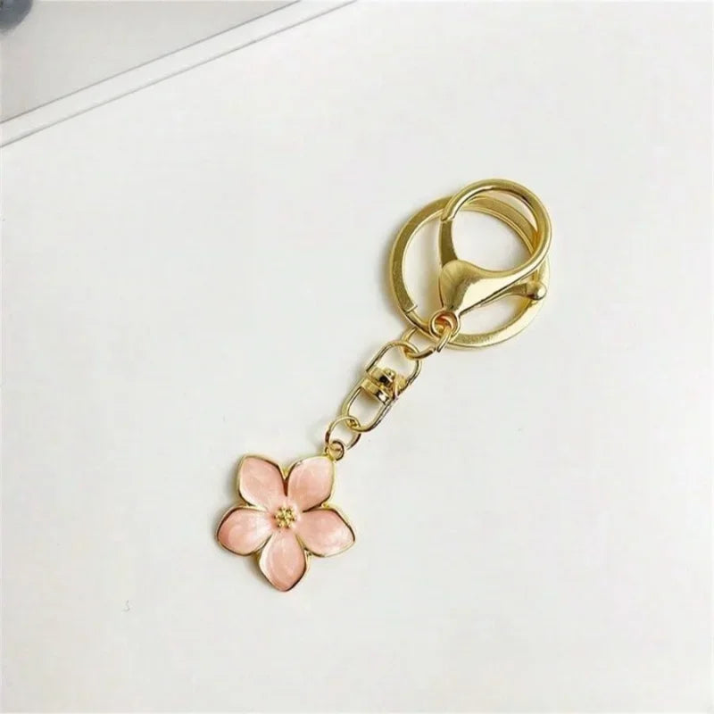 Bijou de Sac Fleur Cerisier Dore