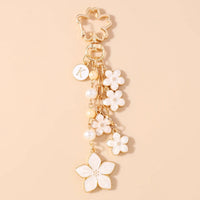 Bijou de Sac Pendentif Fleur Blanche