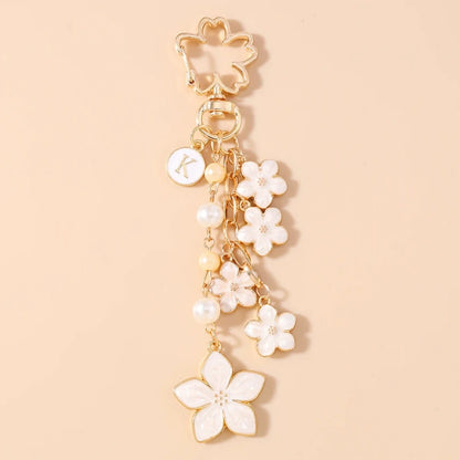 Bijou de Sac Pendentif Fleur Blanche