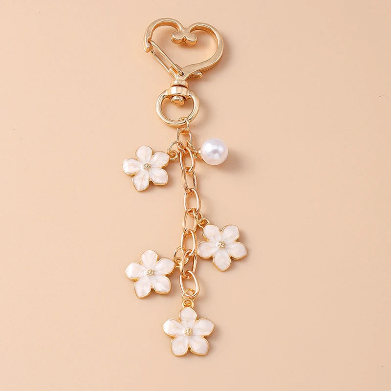 Bijou de Sac Pendentif Fleur Blanche