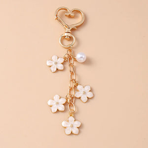Bijou de Sac Pendentif Fleur Blanche