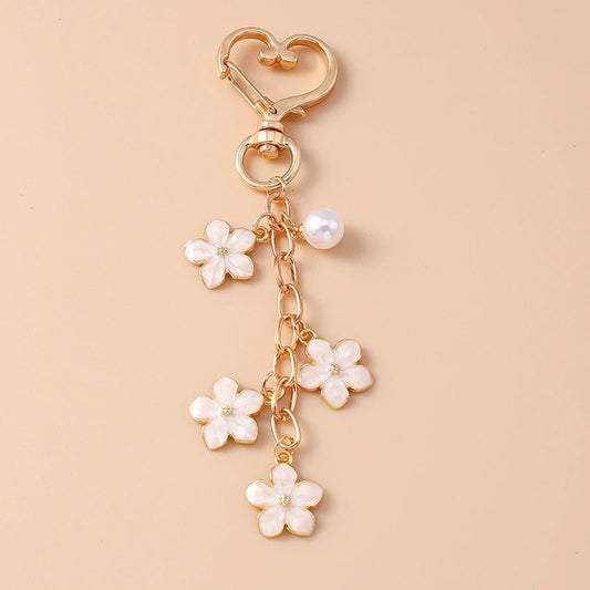 Bijou de Sac Pendentif Fleur Blanche