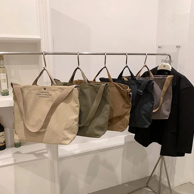 Sacs cabas bandoulière en toile — tous les coloris accrochés