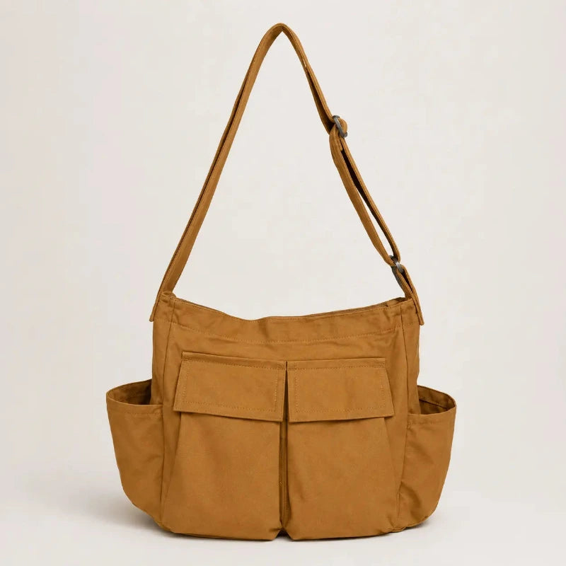 Sac cabas bandouliere marron vue de face sur fond blanc