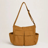 Sac cabas bandouliere marron vue de face sur fond blanc