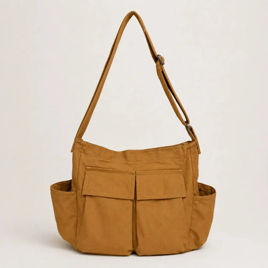 Sac cabas bandouliere marron vue de face sur fond blanc