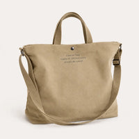 Sac cabas bandoulière en toile beige — vue de face sur fond blanc