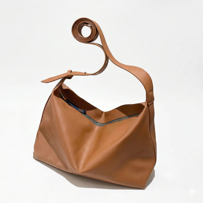 sac marron sur fond blanc