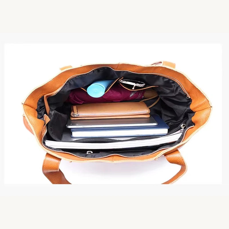 Sac cabas cuir grand format femme, intérieur rempli illustrant la capacité