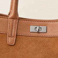 Sac cabas daim porté épaule femme bronze, détail du fermoir
