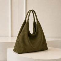 Grand sac cabas vintage daim vert — vue de face sur fond blanc