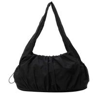 Sac cabas effet drape noir — vue de face sur fond blanc