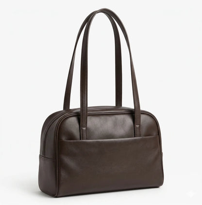 sac marron sur fond blanc
