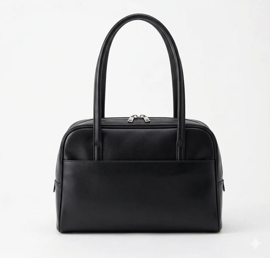 sac noir sur fond blanc
