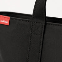 Détail de la couture et de l'attache d'anse du sac cabas oxford grand format