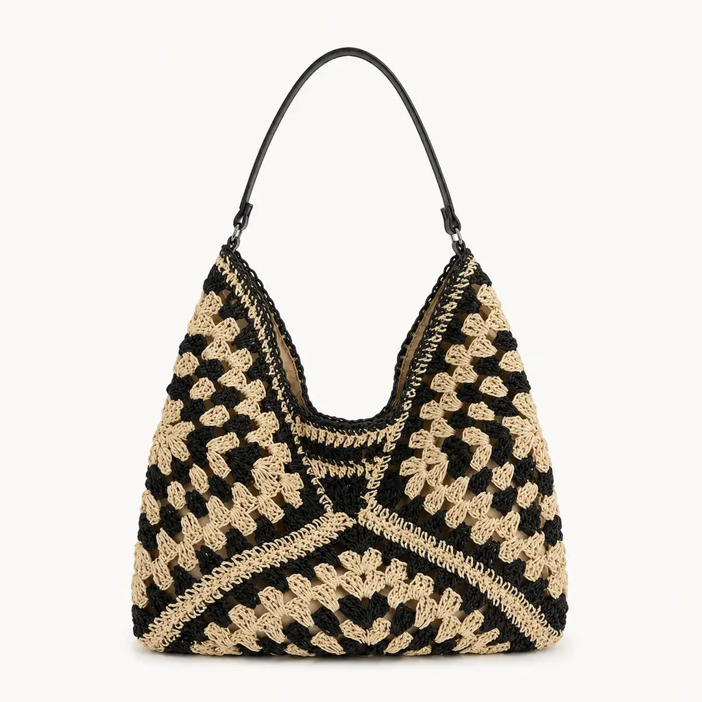 sac cabas paille ajouré noir sur fond blanc
