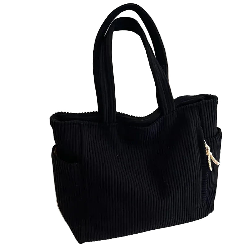 sac noir sur fond blanc