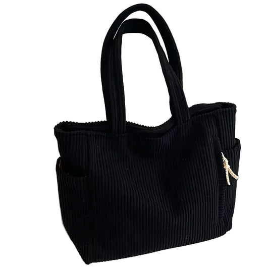 sac noir sur fond blanc