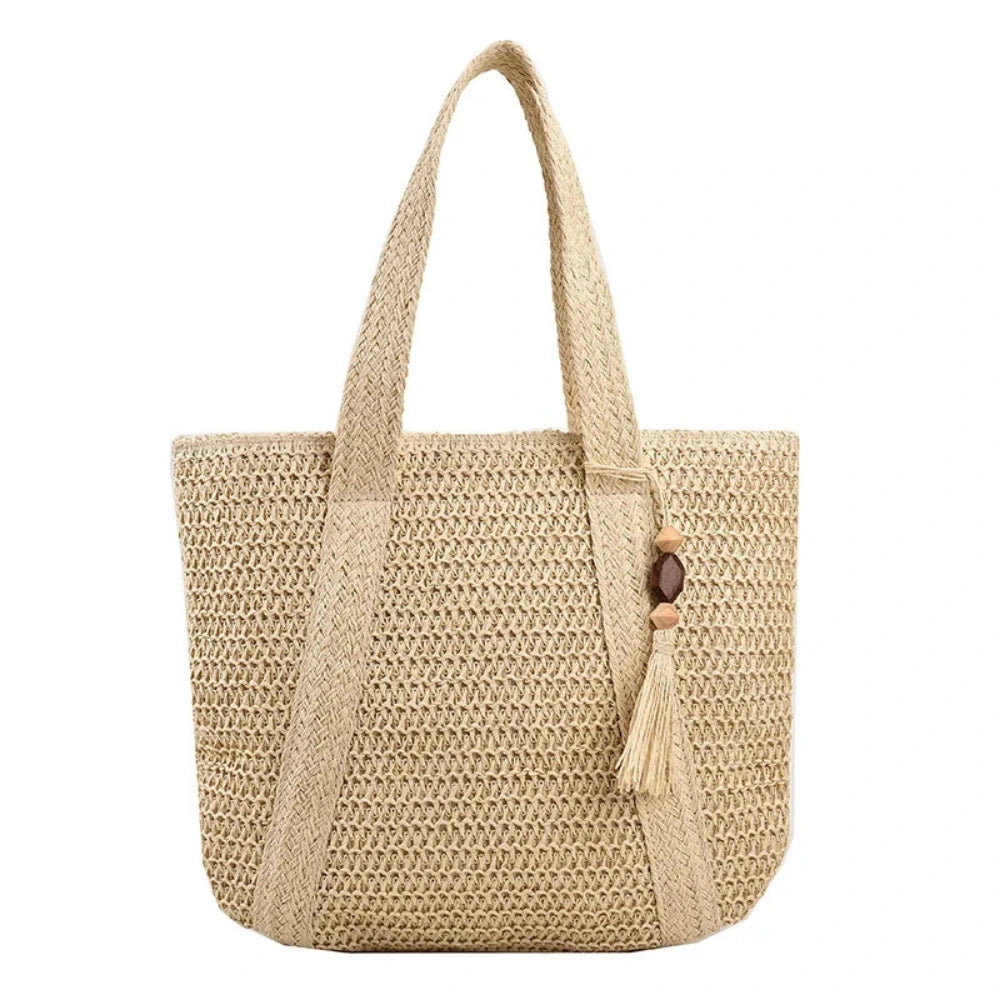 Sac cabas tressé en paille beige — vue de face sur fond blanc
