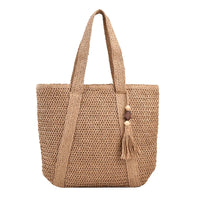 Sac cabas tressé en paille kaki — vue de face sur fond blanc