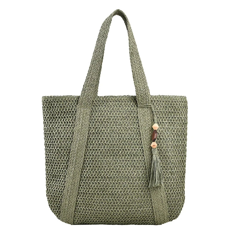 Sac cabas tressé en paille vert — vue de face sur fond blanc