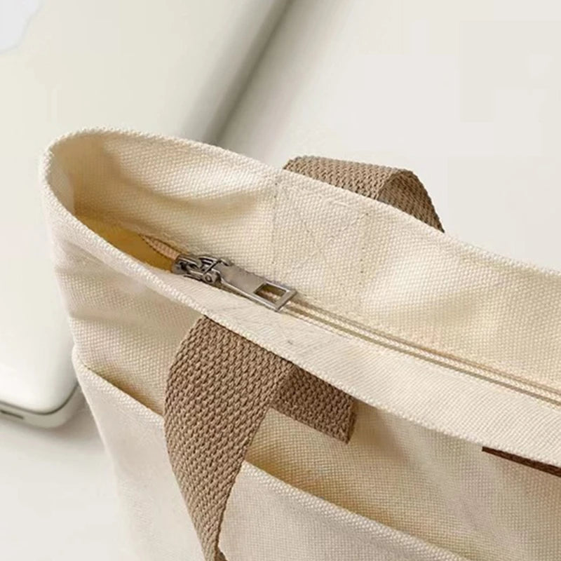 Sac cabas en toile bicolore — zoom fermeture éclair