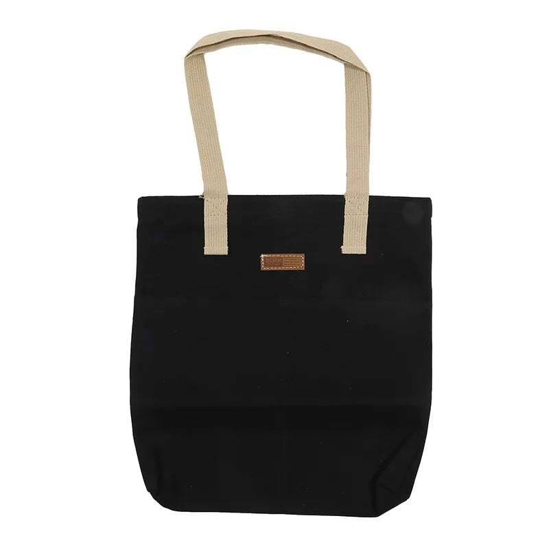Sac cabas en toile bicolore noir — vue de face sur fond blanc