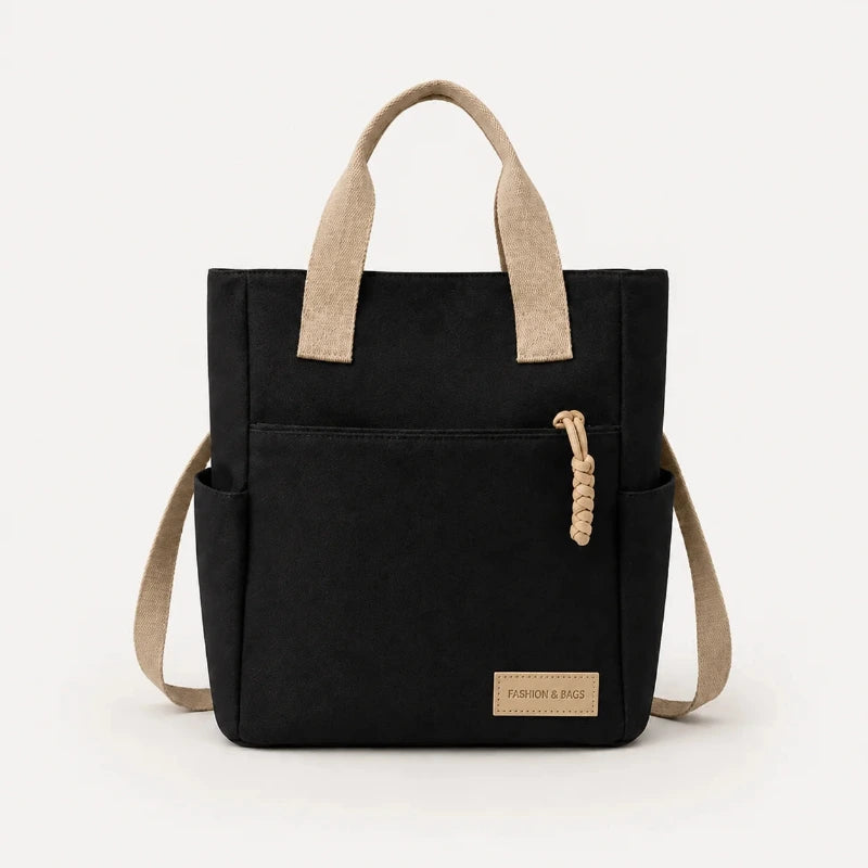 Sac cabas étanche en toile noir — vue de face sur fond blanc