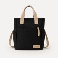 Sac cabas étanche en toile noir — vue de face sur fond blanc