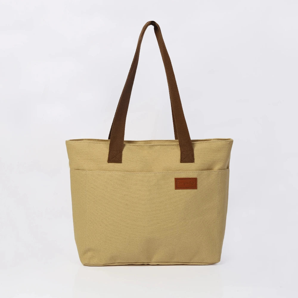 Sac cabas en toile minimaliste kaki — vue de face sur fond blanc