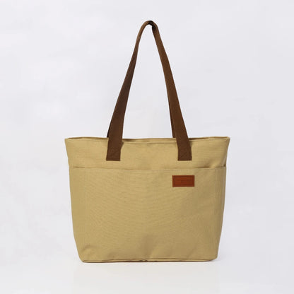Sac cabas en toile minimaliste kaki — vue de face sur fond blanc