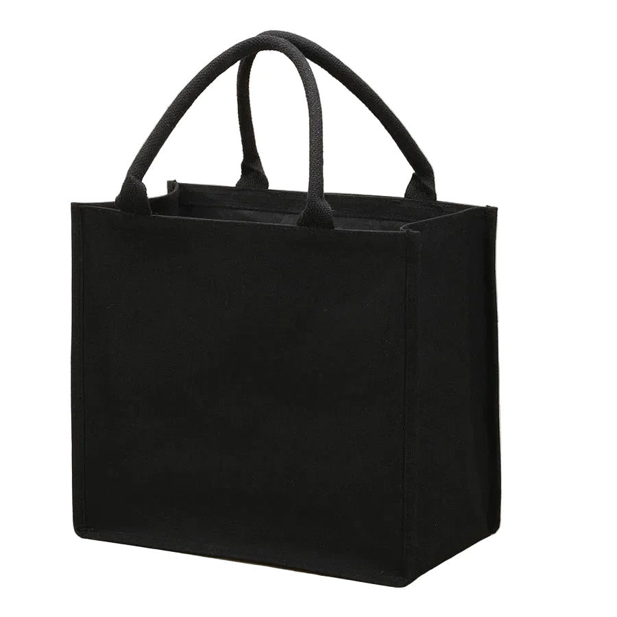 Sac cabas en toile noir — vue de face sur fond blanc