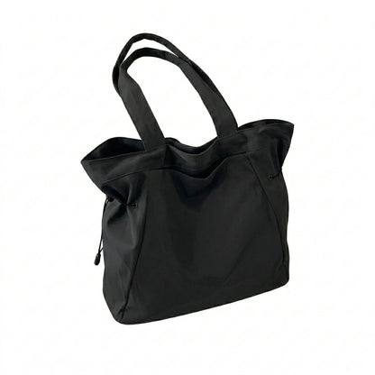 Sac cabas urbain grand format noir — vue de face sur fond blanc