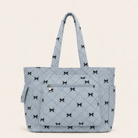 sac cabas velours noeud bleu sur fond blanc